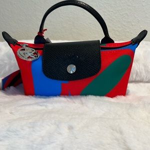 LONGCHAMP X ROBERT INDIANA POUCH